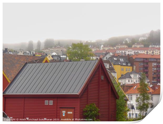 beautiful norwegian village covered with fog during day time Print by Anish Punchayil Sukumaran