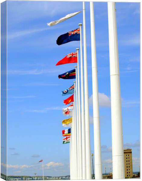 International Flags on the Hoe at Plymouth in Devon. Canvas Print by john hill