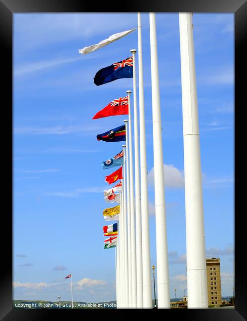 International Flags on the Hoe at Plymouth in Devon. Framed Print by john hill