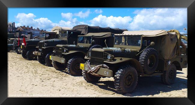 Military trucks and jeeps on Weymouth beach Framed Print by Ann Biddlecombe