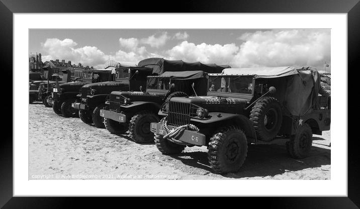 Military trucks and jeeps on Weymouth beach in mon Framed Mounted Print by Ann Biddlecombe