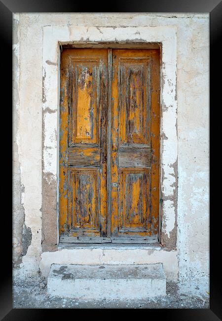 Old Wooden Yellow Door in Greece Framed Print by Neil Overy