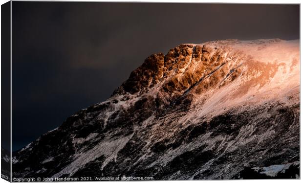 Morning light on the Glyder mountains Canvas Print by John Henderson