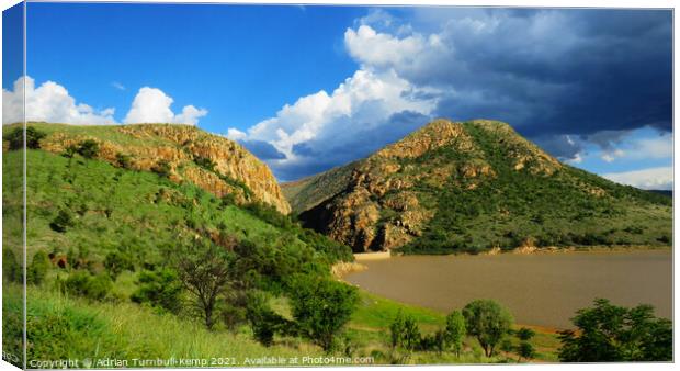 Dramatic clouds over Olifantsnek Dam, North West, South Africa Canvas Print by Adrian Turnbull-Kemp