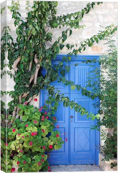 Old Blue Greek Door, Kastellorizo or Meis, Greece Canvas Print by Neil Overy