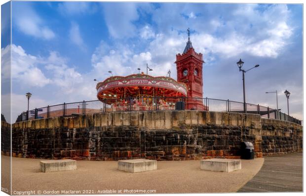 Cardiff Bay, the Carousel and the Pierhead Building Canvas Print by Gordon Maclaren