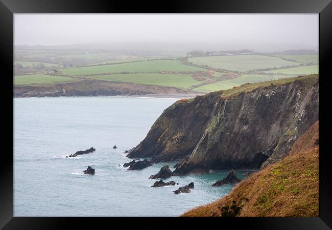Moody weather at Abermawr, Pembrokeshire, Wales Framed Print by Andrew Kearton