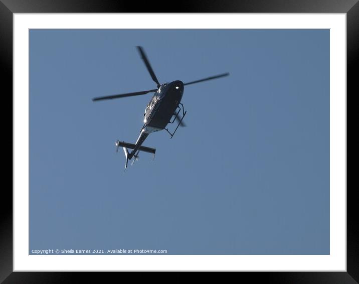 Helicopter in Flight Framed Mounted Print by Sheila Eames