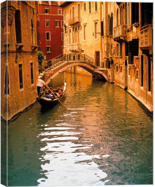 Gondola with tourist on backwater Canvas Print by Philip Enticknap