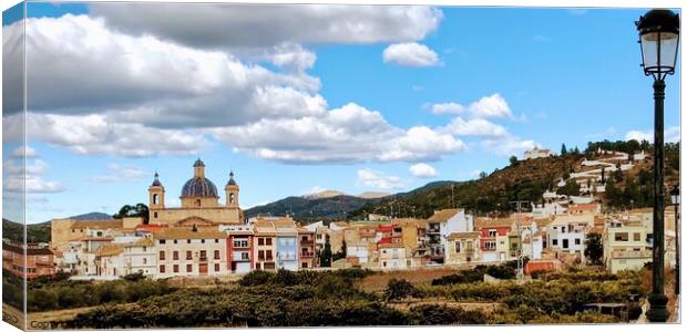 Picturesque Spanish hill town Canvas Print by Deborah Welfare