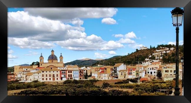 Picturesque Spanish hill town Framed Print by Deborah Welfare