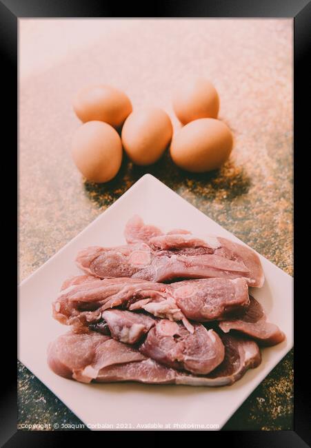 Raw meat and eggs for cooking Framed Print by Joaquin Corbalan