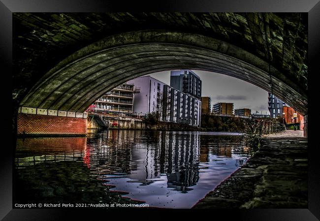 Manchester city centre in reflection Framed Print by Richard Perks