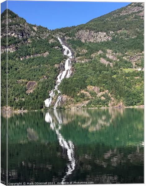 Reflection of a Norwegian waterfall  Canvas Print by Mark ODonnell