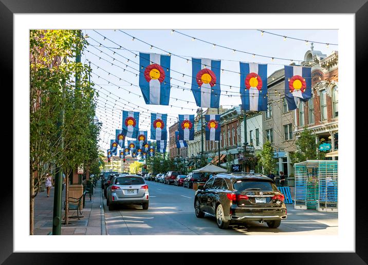 Colorado Flags in historic Larimer Square in downtown Denver. Framed Mounted Print by Mikhail Pogosov