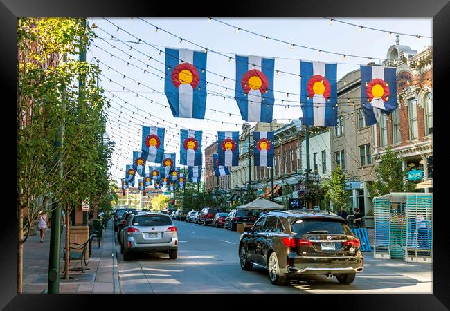 Colorado Flags in historic Larimer Square in downtown Denver. Framed Print by Mikhail Pogosov