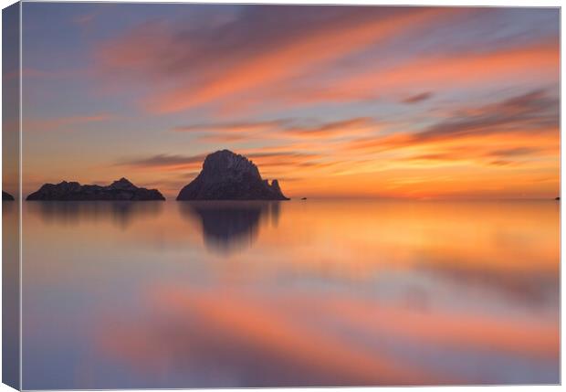 Montage of a sunset in Es Vedra and its reflection in the water Canvas Print by Vicen Photo