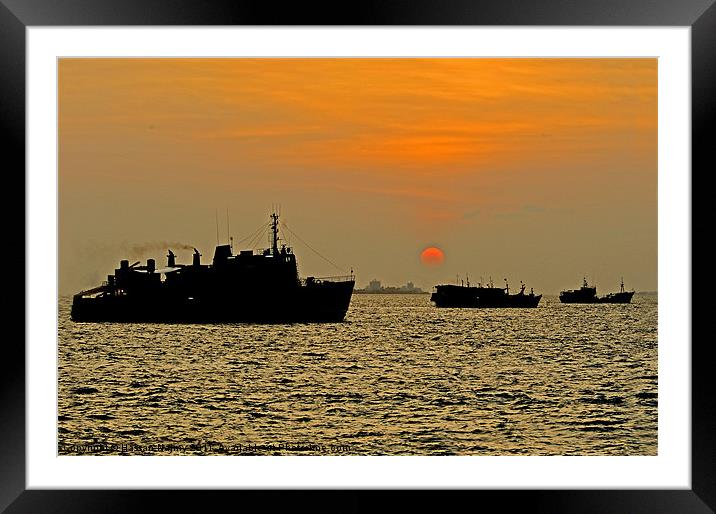 boats at sunset Framed Mounted Print by Hassan Najmy