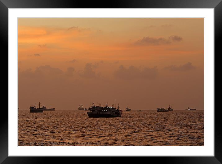 boats in sunset Framed Mounted Print by Hassan Najmy