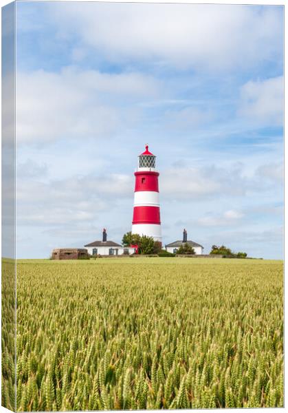 Majestic Happisburgh Lighthouse Canvas Print by Kevin Snelling
