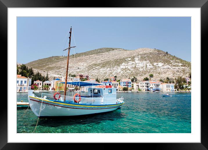 Fishing boat in harbour Kastellorizo, Greece Framed Mounted Print by Neil Overy