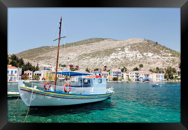 Fishing boat in harbour Kastellorizo, Greece Framed Print by Neil Overy