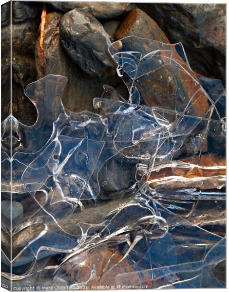 Thin broken ice sheet fragments over rocks Canvas Print by Photimageon UK