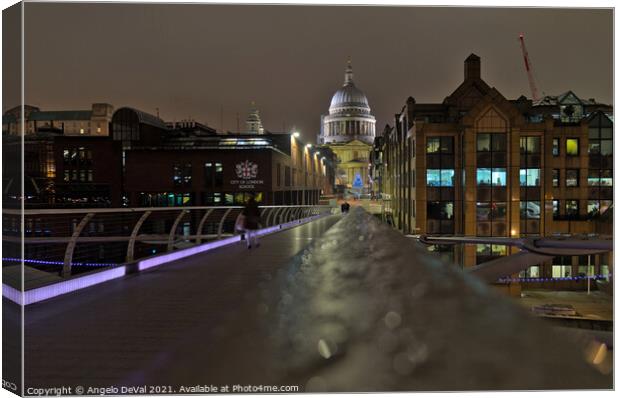 Millennium bridge and St Pauls Cathedral view in London Canvas Print by Angelo DeVal