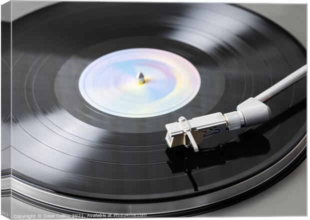 Vinyl Record Playing on a Record Player Canvas Print by Dave Collins
