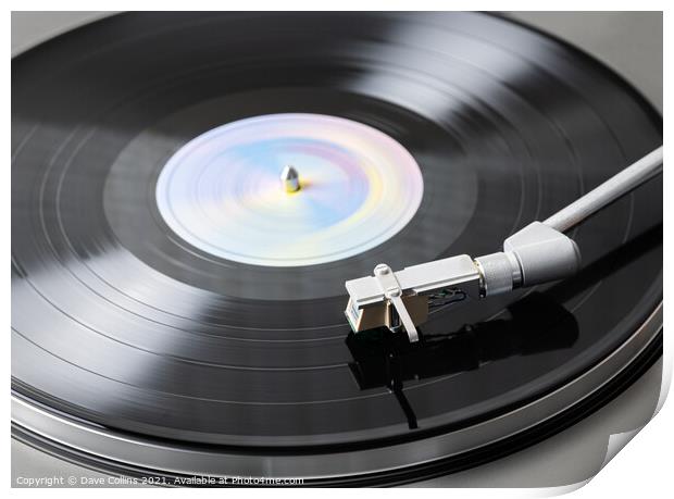 Vinyl Record Playing on a Record Player Print by Dave Collins