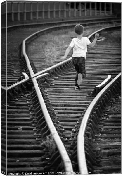 Boy running on old railway tracks in Bristol Canvas Print by Delphimages Art