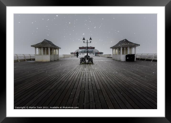 Flurry. Snowfall on Cromer Pier, Norfolk  Framed Mounted Print by Martin Tosh