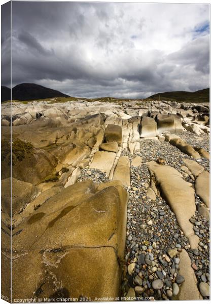 Dramatic cloudy sky above white marble rocks on Camas Malag beach, near Torrin, Isle of Skye, Scotland Canvas Print by Photimageon UK