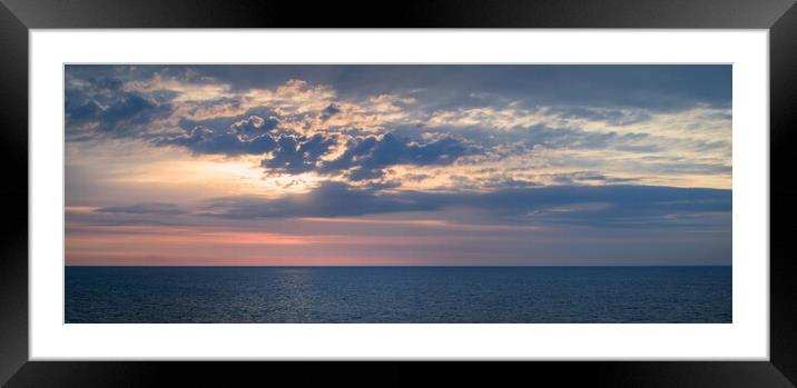 Colorful sky with clouds over the ocean Framed Mounted Print by Wdnet Studio
