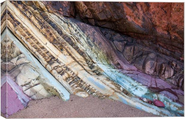 Colourful rocks at Marloes Sands, Pembrokeshire Canvas Print by Andrew Kearton