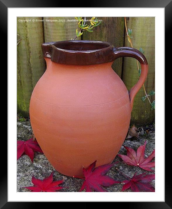 Large Studio Pottery Jug Surrounded By Acer leaves Framed Mounted Print by Ernest Sampson