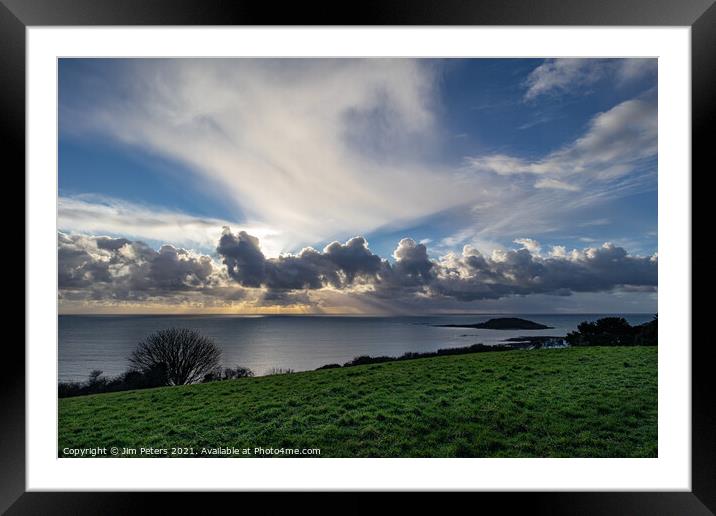 Spectacular light show in Looe Bay over Looe Island Cornwall Framed Mounted Print by Jim Peters