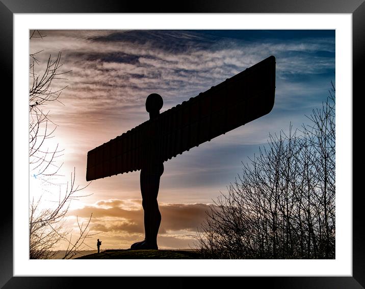Standing at the foot of The Angel of the North Framed Mounted Print by Glen Allen