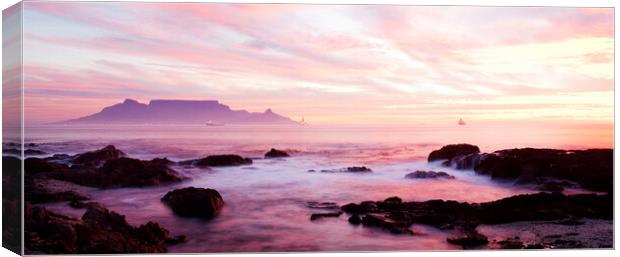 Sunset over Cape Town across Table Bay, South Afri Canvas Print by Neil Overy
