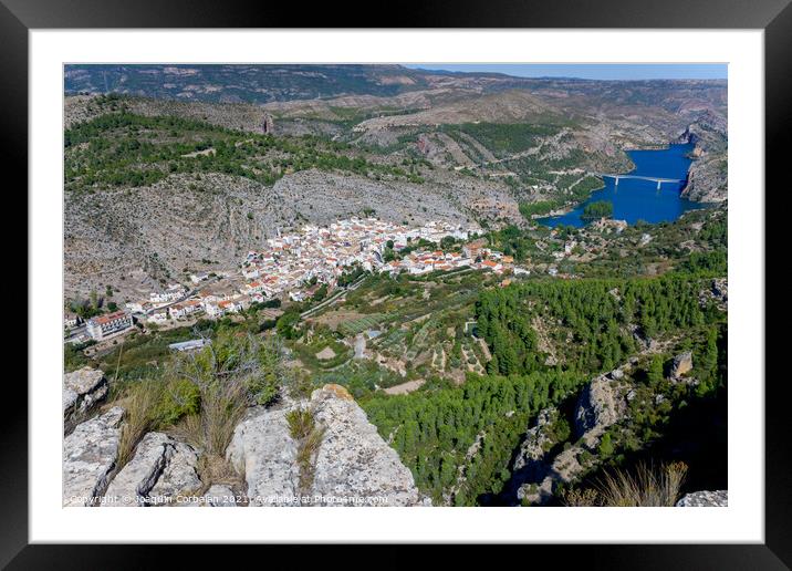 Aerial view of the reservoir and bridge over the town of Cortes  Framed Mounted Print by Joaquin Corbalan