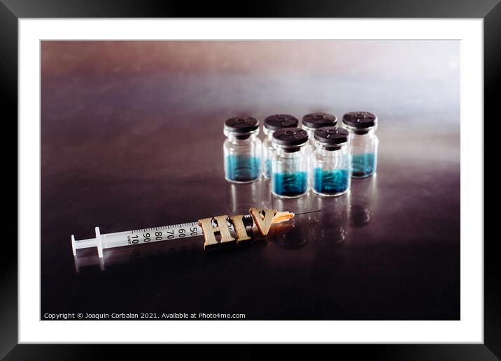 New AIDS treatment, vaccination with syringe with new vaccine, l Framed Mounted Print by Joaquin Corbalan
