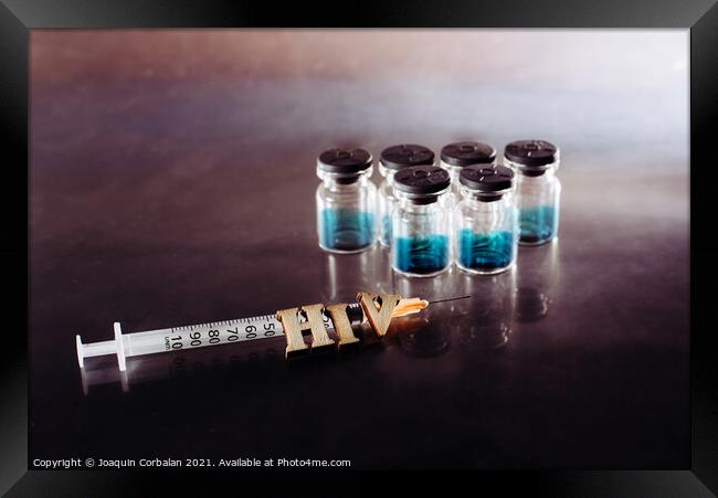New AIDS treatment, vaccination with syringe with new vaccine, l Framed Print by Joaquin Corbalan
