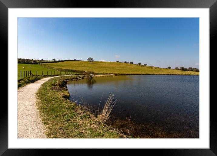 Siblyback Lake in the spring sunshine Framed Mounted Print by Jim Peters