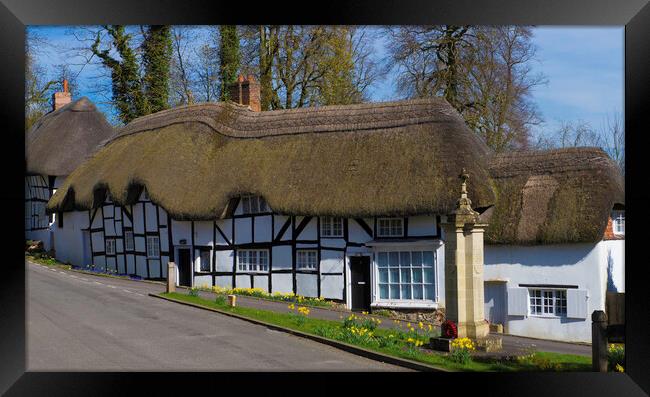 Thatched Cottage and War Memorial Wherwell,Hampshire ,England. Framed Print by Philip Enticknap