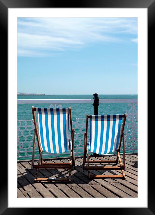 Pair of Deckchairs on Brighton Pier Framed Mounted Print by Neil Overy