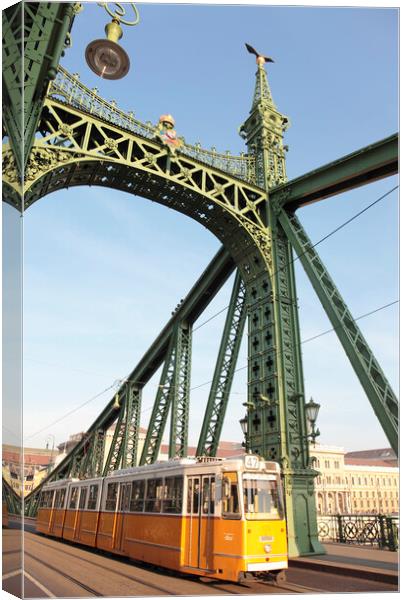 City Tram on Liberty Bridge or Freedom Bridge, Budapest, Hungary Canvas Print by Neil Overy