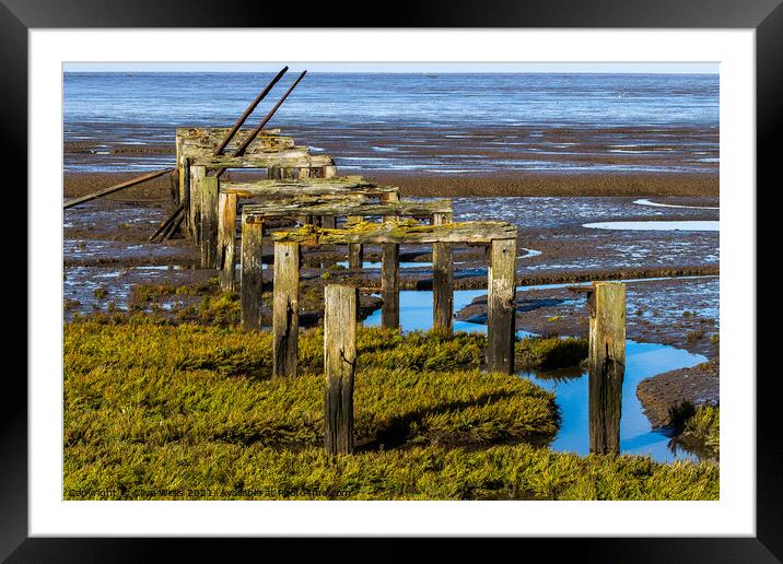 Old wooden pier Framed Mounted Print by Clive Wells