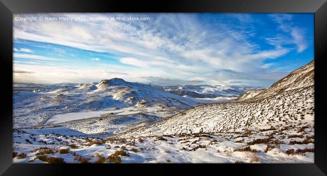A view of Loch a' Choire, near Pitlochry, Perthshire in winter from the path to Ben Vrackie Framed Print by Navin Mistry