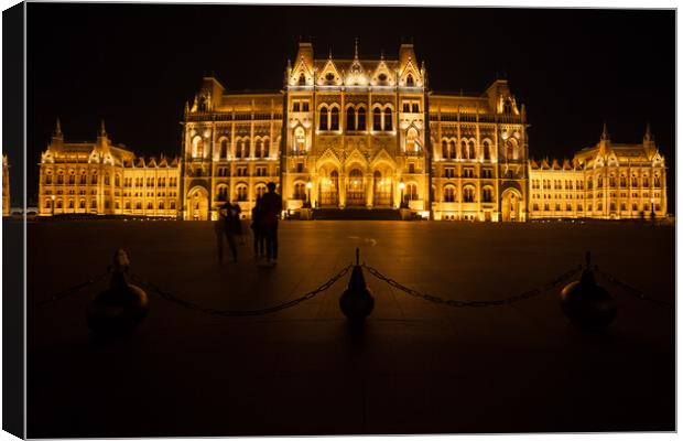 Hungarian Parliament Building Illuminated at Night in Budapest Canvas Print by Artur Bogacki