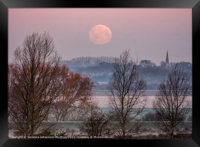 Fullmoon setting over Stretham in the Fens Framed Print by Veronica in the Fens